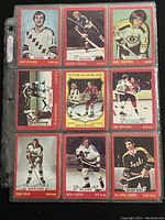 Front view of 9 hockey trading cards in protective sleeve showing players Rod Gilbert, Garry Unger, Greg Sheppard, Bill White (All-Star), Joe Watson, Tom Reid, Jack Egers, Hillard Graves.