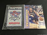1997 Toronto Raptors yearbook with player on cover and team logo
