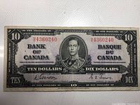 Front of 1937 Canadian $10 banknote showing King George VI portrait, serial number N4360240, and bilingual text.