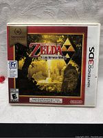 Front cover of Nintendo 3DS game case for The Legend of Zelda: A Link Between Worlds, displays Nintendo Selects branding and rating.