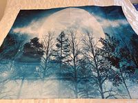 Full view of the cotton wall tapestry showing the moonlit tree scene spread flat on a white background.