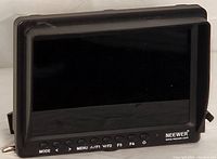 Front view of a black 7 inch Neewer camera monitor showing the screen and front control buttons.