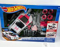 Front view of Hot Wheels Ready-to-Race Car Builder kit in original packaging showing car body and tool pieces