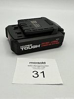 Black Hyper Tough 20V Max Lithium-Ion battery showing front label with brand and voltage information.