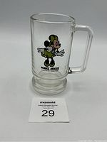 Clear glass mug with colored Minnie Mouse graphic on front