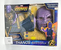 Front view of the boxed Thanos deluxe costume set including mask, top, and Infinity Gauntlet
