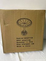 Cardboard box packaging of Vcuteka resin birdbath with product illustration and size measurements 51 x 10 x 51 cm