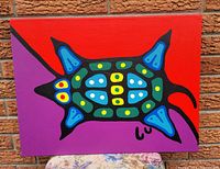 Full view of front of painting showing red and purple background with stylized turtle motif
