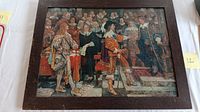 Framed print of historical scene showing Charles I with several courtiers and officials inside a chamber, richly detailed, with scratch marks on the surface visible.