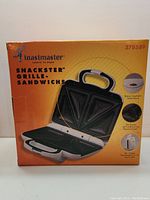 Photo of Toastmaster Snackster sandwich maker original unopened box with front image of appliance and features