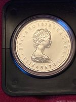Obverse of 1978 Canada Commonwealth Games silver dollar showing Queen Elizabeth II and inscriptions.