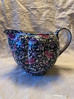 Image of the Royal Doulton chintz pitcher displaying full side view to show shape and pattern.