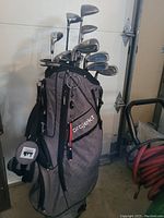 Full view of grey and black Projekt stand bag with clubs inserted