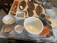 Full view of all pots and some additional garden decor on a table