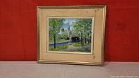 Front view of original oil painting by Eileen Friend featuring the Rideau Canal scene with stained outer frame.