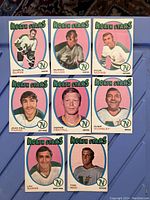 Front sides of eight 1971-72 O-Pee-Chee Minnesota North Stars hockey cards showing player portraits and team branding.