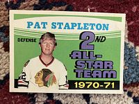 Front side of the 1970-71 OPC Pat Stapleton hockey card showing player image, position (defense), and 2nd All-Star Team designation.