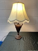Full view of the lamp lit and showing overall size and appearance