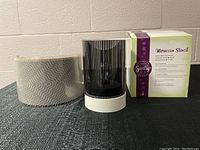 Moroccan Stencil Scentsy warmer with original box and removable patterned white cover displayed on gray surface.