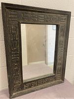 Full view of rectangular mirror with rustic carved wooden frame, showing overall size and design.