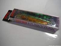 Photo of the new Rapala Husky Jerk HJ10 lure in original packaging showing the box and lure colors.