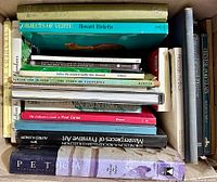 Box containing various hardcover and softcover coffee table books on art, antiques, and cultural history with visible titles and good condition.
