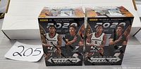 Two sealed 2020-21 Panini Prizm NBA basketball blaster boxes, front view showing branding and player images.