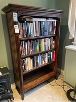 Front view of bookcase filled with books