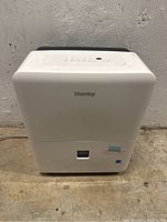 Front view of white Danby portable AC showing logo and front panel design
