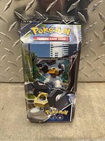 Front view of the sealed Pokémon GO Premium Collection box featuring Meltan and Pokémon GO branding.