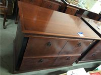 Front view of the Kimball wood credenza showing the two lateral file drawers with drop ring handles.