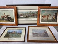 Overview of the 5 framed fox hunting prints grouped together, showing variety of scenes and frame styles.