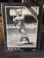 Front view of sealed vintage Babe Ruth baseball poster featuring Babe Ruth batting in Boston Red Sox uniform with 1916 date and 75 Years World Champs text.