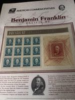 Full view of the unopened souvenir sheet with visible 12 stamps of Benjamin Franklin and a single 5-cent stamp.