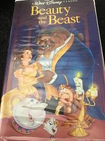 Front cover of Walt Disney Beauty and the Beast VHS case showing animated characters.