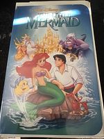 Full view of the VHS sleeve featuring The Little Mermaid characters and title.