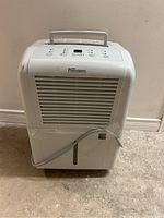 Front view showing Danby Premiere branding, front air vent, and control panel.