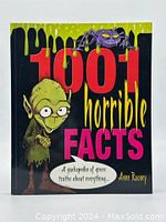 Front cover of the book titled '1001 Horrible Facts' with cartoon zombie and spider illustration on black background with green slime dripping from top.