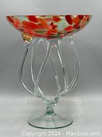 Side view of the jellyfish pedestal bowl showing clear multiple glass legs supporting the bowl with red accents on upper bowl glass.