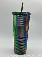Front view of the oil slick rainbow metallic studded Starbucks tumbler showing colorful reflective surface and embossed logo.