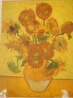 Front view of the plaque showing a detailed reproduction of Van Gogh's Sunflowers painting in warm yellow and orange tones with green accents.