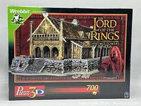 Front view of the puzzle box showing artwork of The Golden Hall from Lord of the Rings with 700 pieces indicated