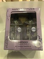 Two bottles of Vitabath Lavender Chamomile Hand Sanitizer visible within the original lavender-colored box with clear window showing product.