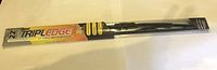 Photo of a 22 inch Triple Edge brand premium silicone windshield wiper blade in packaging, showing size and branding.