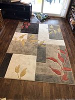 Full view of the Roma Brands synthetic area rug showing the entire pattern and size relative to the floor.