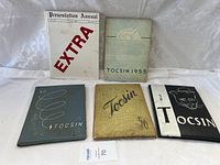Five vintage Tocsin yearbooks dated 1955, 1956, 1957, 1958, plus an EXTRA Presentation Annual book laid out showing front covers.