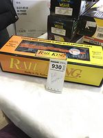 Photo showing Rail King box with B&O boxcar branding inside, part of the maxsold tag visible.