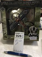 Boxed WWI German Halberstadt model plane with visible packaging and display stand.