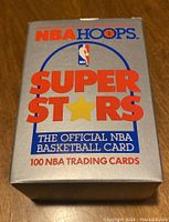 Front view of the original sealed box showing the branding, NBA logo, and quantity of cards.