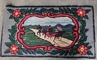 Full view of the rectangular hooked rug showing the folk art depiction of a horse-drawn carriage on a rural road surrounded by floral borders.